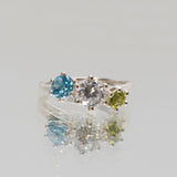 une - Topaz, Cubic Zirconia and Peridot Triad Ring