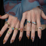 une - Topaz, Cubic Zirconia and Peridot Triad Ring